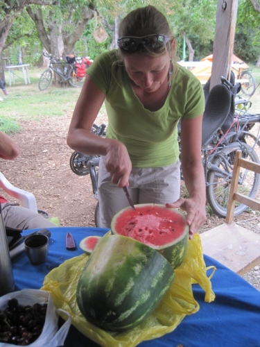 Martine cutting the giant watermelon