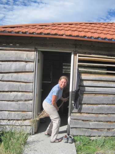 Martine displaying her sweeping skills at the red roof refuge