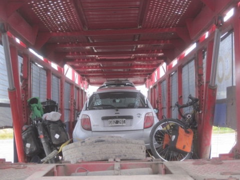 Our bikes safely strapped onto the car transporter
