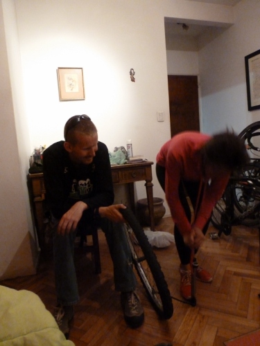 Teachign Virginia the basics of bike mechanics as she prepares for her tour